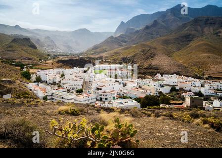 View of the tourist town of Agaete and the mountains of Tamadaba Rural Park in the background, Gran Canaria, Canary Islands, Spain Stock Photo