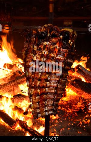 Roasted Crispy Ribs, traditional Argentinian barbecue Stock Photo - Alamy