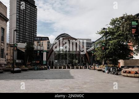 Front view of Winter Gardens in Sheffield in Tudor Square with St Paul's Tower in the background Stock Photo