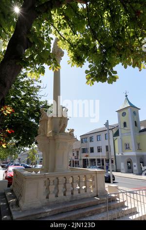 The trinity column and town hall of Neusiedl am See. Burgenland, Austria Stock Photo