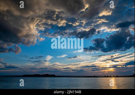 July 8, 2022.  7:54:02 pm. After rain squall.  View from Barnes Island.  Casco Bay, Maine.  Rain Storm Series. Stock Photo