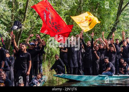 Shia Muslim mourners shout religious slogans during a procession on the ...