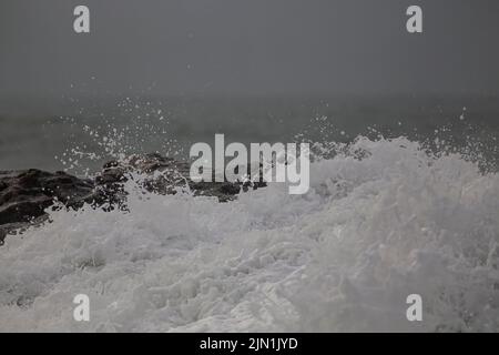 Detailed breaking wave splash. Northern portuguese rocky coast. Stock Photo