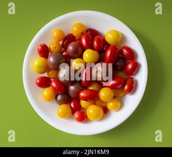 A Bowl Full of Colorful Cherry and Grape Tomatoes Stock Photo