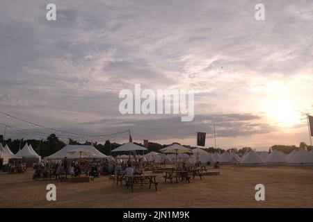 A scenic sunset view over the Latitude Music Festival area, in Suffolk Stock Photo