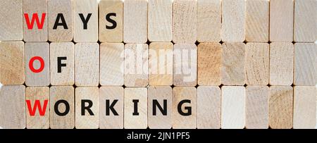 WOW ways of working symbol. Concept words WOW ways of working on wooden blocks on a beautiful wooden background. Business and WOW ways of working conc Stock Photo