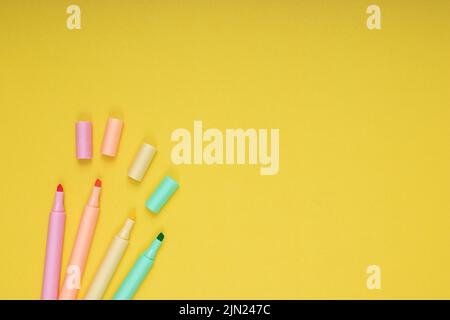 colored pencils. back to school. Isolated yellow background Stock Photo