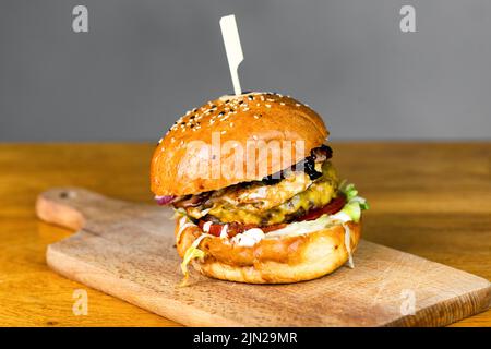 fresh tasty burger on table. bunhealthy fast food Stock Photo