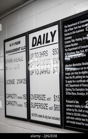 Parking Garage Rates Sign in New York City, USA  2022 Stock Photo