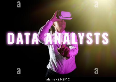 Writing displaying text Data Analysts. Word for Programmer Design and Create Report Identifies patterns Woman Using Virtual Reality Simulator And Stock Photo
