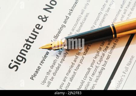 Close up of a vintage fountain pen on a legal document, United States Stock Photo