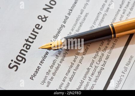 Close up of a vintage fountain pen on a legal document, United States Stock Photo