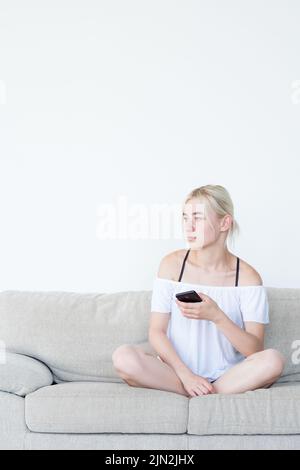woman phone idle lifestyle home leisure network Stock Photo