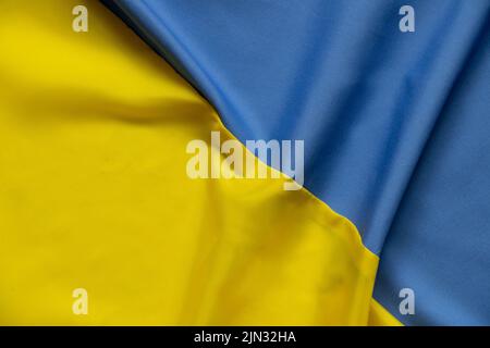 Yellow-blue national flag of Ukraine as a background, stop war and peace in Ukraine Stock Photo