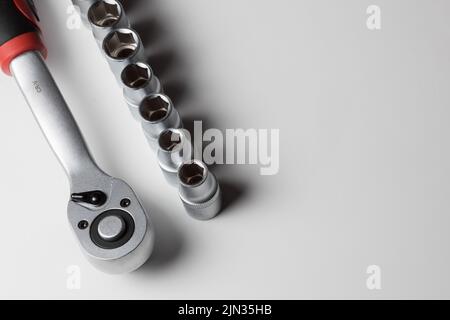 Manual metalworking tool. socket wrench isolated on white background. Sets of rattles. chrome plating Stock Photo