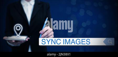 Handwriting text Sync Images, Word Written on Making photos identical in all devices Accessible anywhere Lady in suit holding pen symbolizing successf Stock Photo