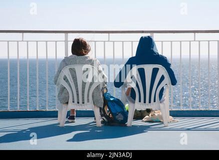 A couple of holidaymakers on the Cross Channel Ferry Stock Photo