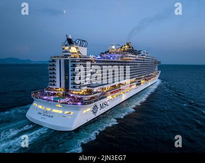 MSC Seaview is a Seaside-class cruise ship owned and operated by MSC Cruises.  Aerial view as the huge cruise ship leaves Naples port early evening. Stock Photo