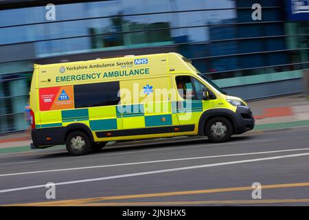 A Yorkshire Ambulance Service emergency ambulance seen in Leeds City Centre Stock Photo