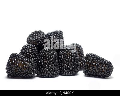 black chewy candies in the form of berries. Sweets in the form of blackberries on a white background. Marmalade isolate. sweet food Stock Photo