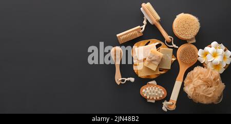 Set of bath supplies on black background with space for text Stock Photo