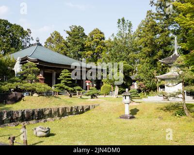 Minamiuwa, Ehime prefecture, Japan - April 8, 2018: On the grounds of Kanjizaiji, temple number 40 of Shikoku pilgrimage Stock Photo