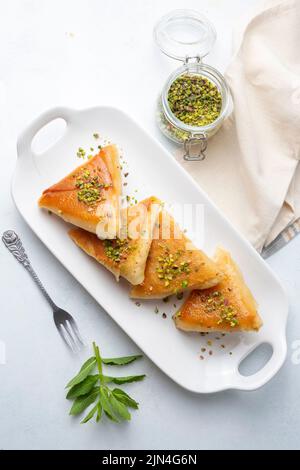 Triangular Deserrts Traditional Turkish desserts; custard triangular dessert, albanian ...