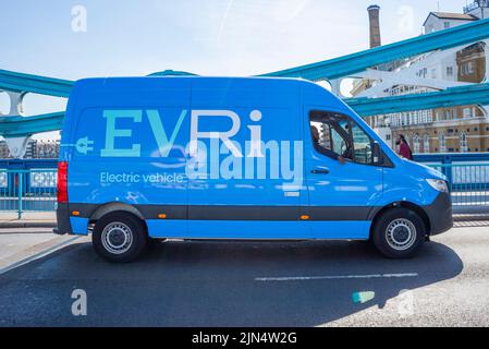 EVRi electric vehicle driving in London. Formerly Hermes. EVRi electric van crossing Tower Bridge. Mercedes eSprinter ev Stock Photo