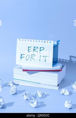 Hand writing sign Erp For It. Internet Concept Enterprise resource planning software for integrate applications Important Idea Shown On Note On Desk Stock Photo