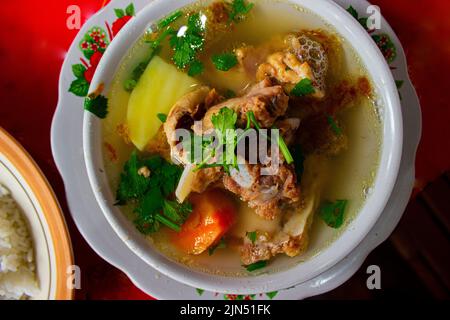 sop buntut or oxtail soup or tail soup is traditional soup made from tail ox, Boiled with Spices Stock Photo