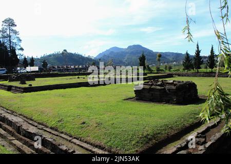 Wonosobo, Indonesia - June 2020 : Local tourists visit Arjuna temple complex at Dieng Plateau after the covid 19 emergency response period Stock Photo