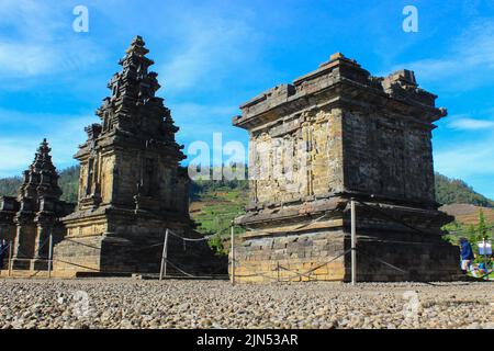 Wonosobo, Indonesia - June 2020 : Local tourists visit Arjuna temple complex at Dieng Plateau after the covid 19 emergency response period Stock Photo