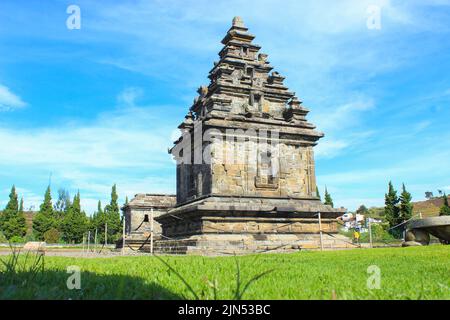 Wonosobo, Indonesia - June 2020 : Local tourists visit Arjuna temple complex at Dieng Plateau after the covid 19 emergency response period Stock Photo