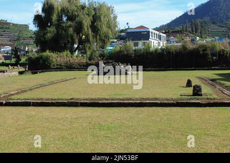 Wonosobo, Indonesia - June 2020 : Local tourists visit Arjuna temple complex at Dieng Plateau after the covid 19 emergency response period Stock Photo