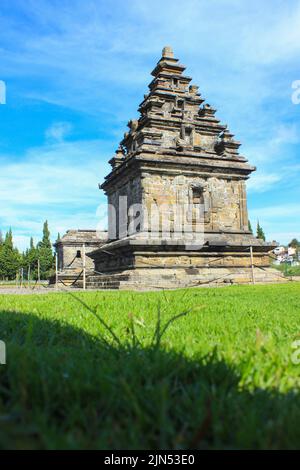 Wonosobo, Indonesia - June 2020 : Local tourists visit Arjuna temple complex at Dieng Plateau after the covid 19 emergency response period Stock Photo