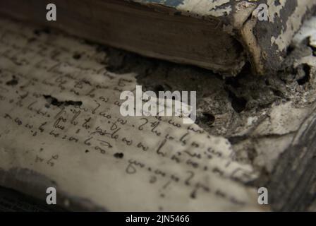 A book written in ancient letters is being reconstructed at the National Library in Jakarta, Indonesia. Stock Photo