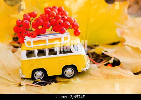 Colorful vintage poster with a car on a beach and Japanese aesthetic with a heartwarming  quote Stock Photo - Alamy