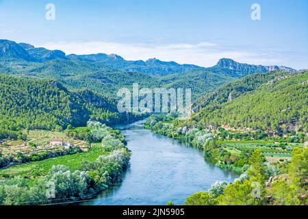 Ebro river valley near village Miravet in Catalonia, Spain, site of the Miravet castle of templar knights on Stock Photo