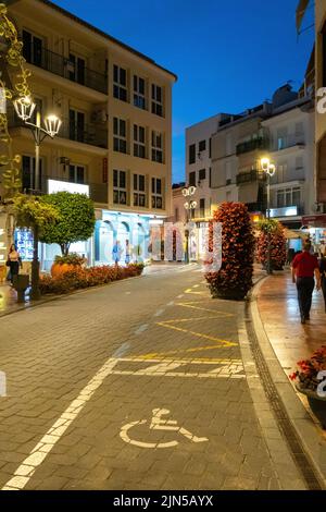Estepona, Malaga, Spain - June 10, 2022: The beautiful Estepona at night, little and flowery town in the province of Malaga, Spain. Stock Photo