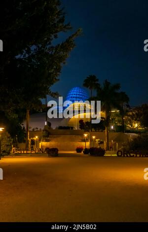 Estepona, Malaga, Spain - June 10, 2022: Night view with illuminated roof of the orchidarium of Estepona. City of Estepona, Malaga Province, Spain Stock Photo