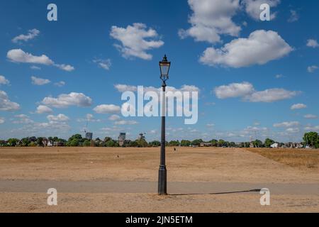 London, UK. 9th August, 2022. UK Weather: Blackheath remains dry parched as the summer drought continues with Britain braced for another heatwave predicted to last longer than July’s record-breaking hot spell, with highs of up to 35C expected over the week. Credit: Guy Corbishley/Alamy Live News Stock Photo