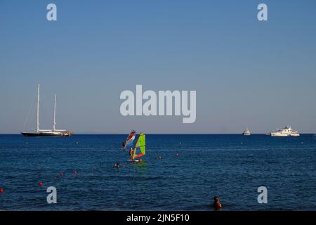 Windsurfing in the beach resort of Paralia Varkiza near Athens in Greece Stock Photo