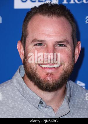 ELYSIAN PARK, LOS ANGELES, CALIFORNIA, USA - AUGUST 08: American professional baseball infielder for the Los Angeles Dodgers of Major League Baseball Max Muncy arrives at Kershaw's Challenge Ping Pong 4 Purpose 2022 held at Dodger Stadium on August 8, 2022 in Elysian Park, Los Angeles, California, United States. (Photo by Xavier Collin/Image Press Agency) Stock Photo