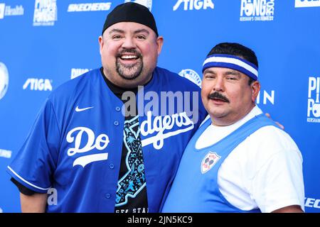 Los Angeles, United States. 08th Aug, 2022. ELYSIAN PARK, LOS ANGELES, CALIFORNIA, USA - AUGUST 08: American comedian Gabriel Iglesias (Fluffy) and Mexican-American talk show personality Guillermo Rodriguez arrive at Kershaw's Challenge Ping Pong 4 Purpose 2022 held at Dodger Stadium on August 8, 2022 in Elysian Park, Los Angeles, California, United States. (Photo by Xavier Collin/Image Press Agency) Credit: Image Press Agency/Alamy Live News Stock Photo