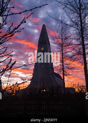 A scenic view of the Hallgrimskirkja church during sunset in Reykjavik, Iceland Stock Photo