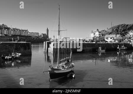 A beautiful ketch leaves Porthleven harbour Stock Photo