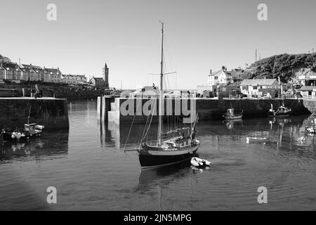 A beautiful ketch leaves Porthleven harbour Stock Photo