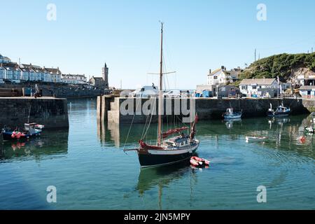 A beautiful ketch leaves Porthleven harbour Stock Photo