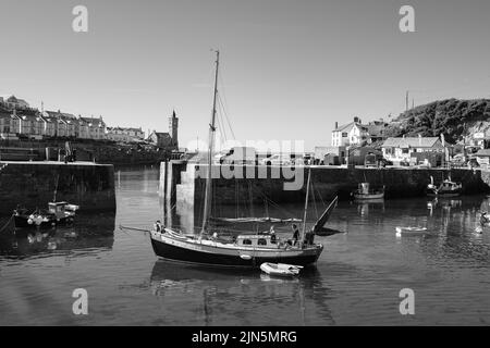 A beautiful ketch leaves Porthleven harbour Stock Photo