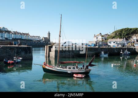 A beautiful ketch leaves Porthleven harbour Stock Photo